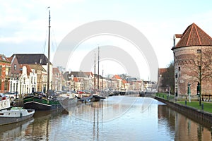 Canal houses and old fashioned boats at Thorbeckegracht in Zwolle