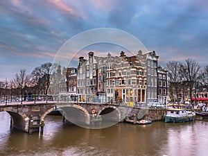 Canal houses sunset Amsterdam