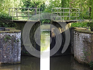 Canal and old water lock photo