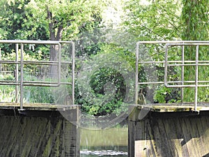 Canal and old water lock photo