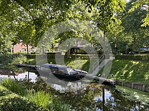 Canal in Oudebildtzijl in Friesland