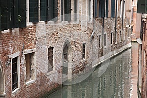 Canal and Red Brick Facade, Venice