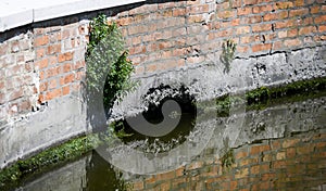 Canal riverbank crumbled for the water erosion effect in Comacchio, Italy