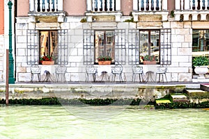 Canal-Side Cafe Terrace in Venice with Ironwork Details