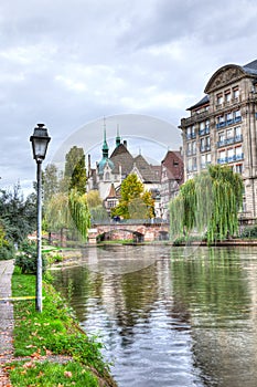 Canal in Strasbourg, France with buildings
