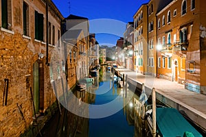 Canal view in Venice, Italy at blue hour before sunrise