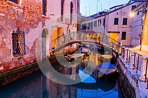 Canal view in Venice, Italy at blue hour before sunrise