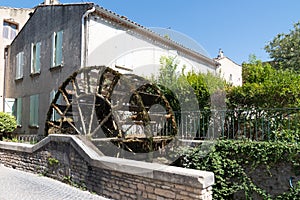 Canal wheel old water mill L`Isle-sur-la-Sorgue Vaucluse Avignon France