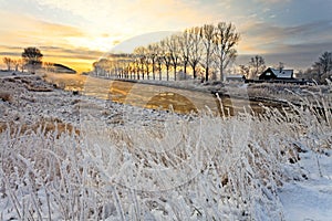 Canal in a white winter landscape