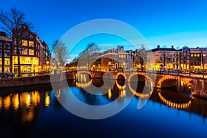 Canals of Amsterdam at night. Amsterdam is the capital and most populous city of the Netherlands