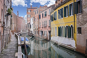 Canals and colorful buildings in Venice.