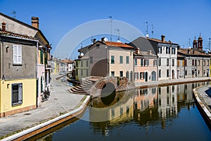 Canals and colorful houses in Comacchio, Emilia Romagna, Italy.