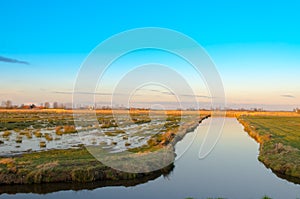 Canals and flooded farmland in holland