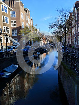 Canals and houses of Amsterdam city, in Holland, Netherlands