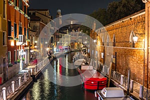 Canals of Venice city with beautiful architecture at night, Italy