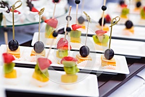 Canape with cheese and olives photo