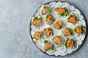 Canape with Muhammara, Adjika, Ajika or Acuka on Small Square Breads with Round Plate.