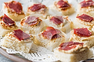 Canape with Pastrami / Pastirma Ham and Hummus on Small Square Bread.