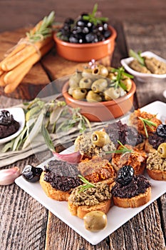 Canape with tapenade and olive