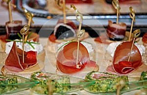 Canapes, appetizers on a plate