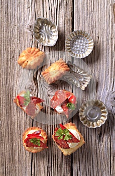 Canapes and small baking molds photo