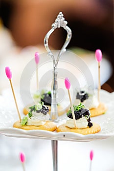 Canapes with smoked salmon and caviar