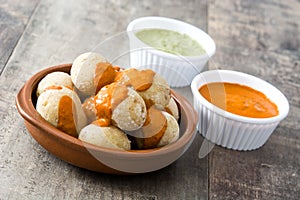 Canarian potatoes (papas arrugadas) with mojo sauce photo