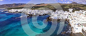 Canary islands travel. Lanzarote, Punta Mujeres traditional fishing village. aerial drone view.