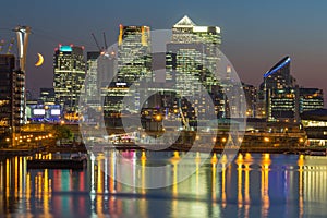 Canary wharf across the Thames at night,London