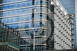 Canary Wharf office's windows lit up at dusk, Business life concept background