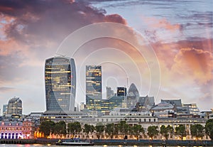 Canary Wharf skyscrapers at sunset, London