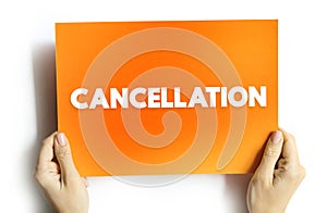 Cancellation - the action of cancelling something, text concept on card