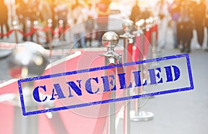 Cancelled event ceremony. Event poster with red carpet and barrier on entrance