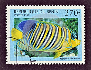 Cancelled postage stamp printed by Benin, that shows Regal Angel fish