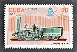 Cancelled postage stamp printed by Cuba, that shows  Old locomotive