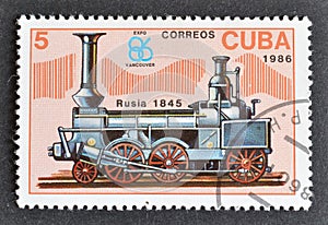 Cancelled postage stamp printed by Cuba, that shows  Old locomotive