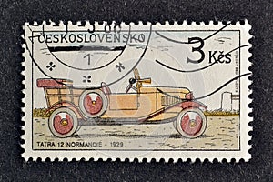 Cancelled postage stamp printed by Czechoslovakia, that shows Tatra 12 Normandie