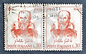 Cancelled postage stamp printed by Italy, that shows portrait by Galileo Galilei