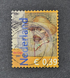 Cancelled postage stamp printed by Netherlands, that shows Self-portrait with straw hat