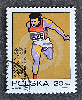 Cancelled postage stamp printed by Poland, that shows Running