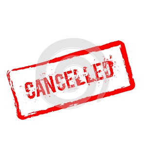 Cancelled red rubber stamp isolated on white.