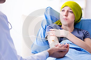 Cancer patient visiting doctor for medical consultation in clini