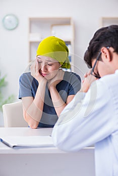 Cancer patient visiting doctor for medical consultation in clini