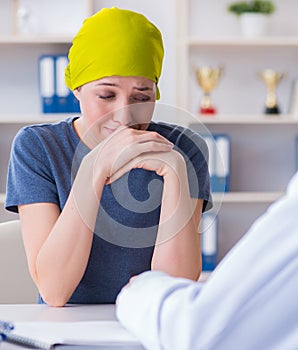 Cancer patient visiting doctor for medical consultation in clini