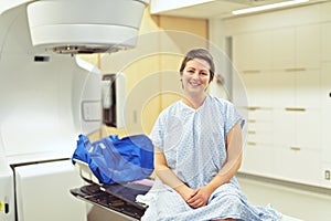 Cancer treatment in a modern medical private clinic or hospital with a linear accelerator. woman lay is undergoing