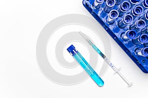 Cancer virus. Medical syringe with needle for protection flu virus and coronavirus. Covid vaccine on white. Medicine concept