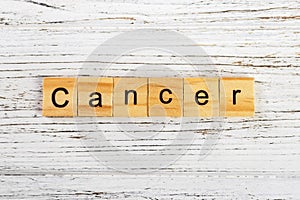 CANCER word made with wooden blocks concept