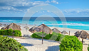 Cancun beach in mexico with umbrellas