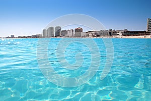 Cancun beach view from turquoise Caribbean