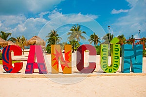 Cancun, Mexico, inscription in front of the Playa Delfines beach. Huge letters of the city name.